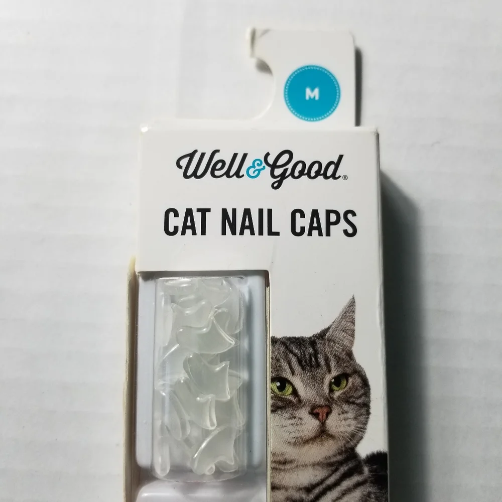 NEW IN BOX WELL AND GOOD CAT NAIL CAPS